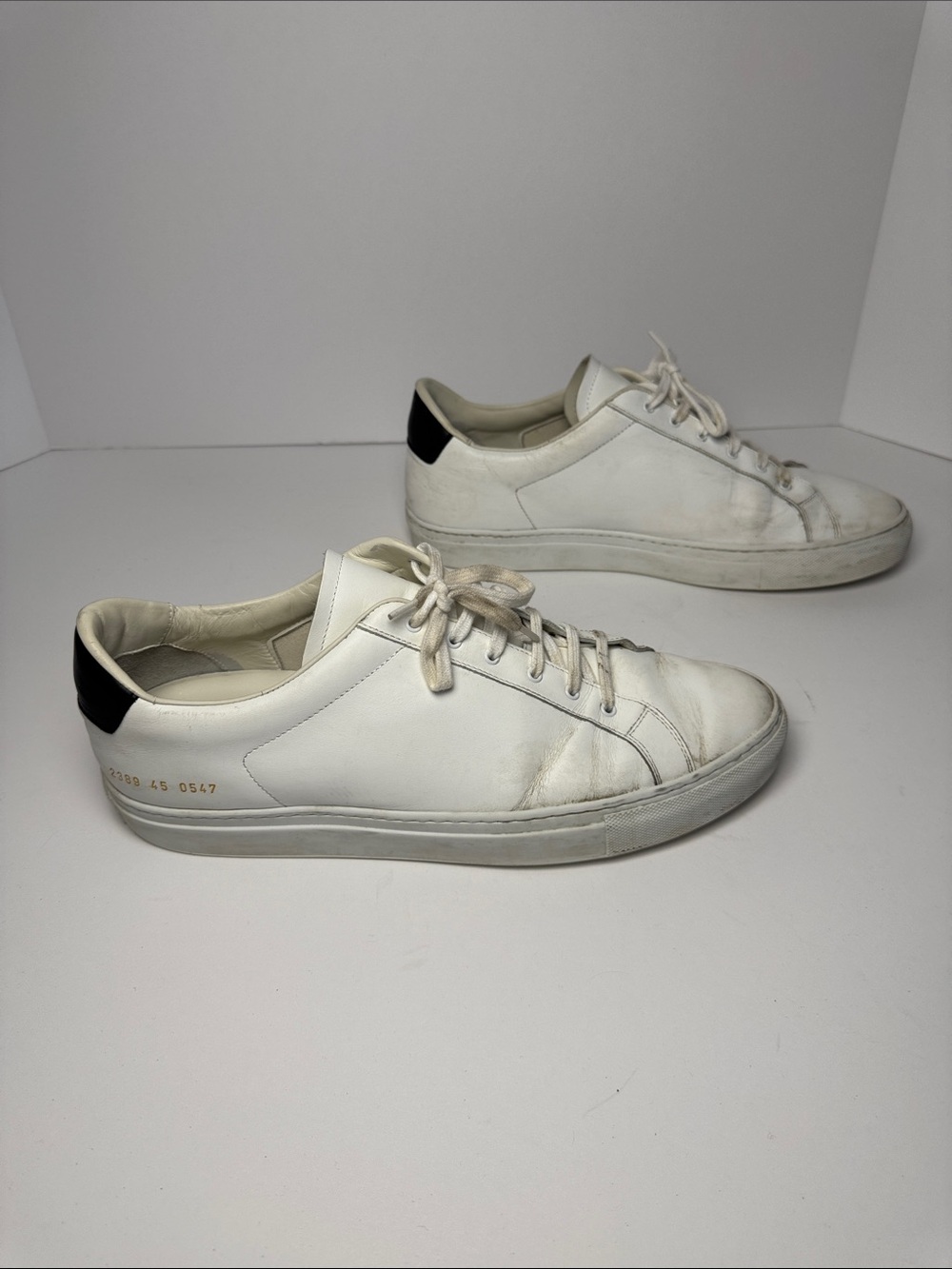 COMMON PROJECTS Men's White Leather Low-Top Sneakers Black Tab Heel Accent 45